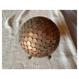 Globe Covered in US Pennies on Base