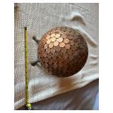 Globe Covered in US Pennies on Base