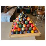Pyramid of Pool Balls on Wood Tray