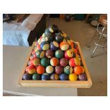 Pyramid of Pool Balls on Wood Tray