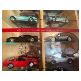Display Cabinet Full of Various Year Corvettes