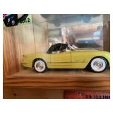 Display Cabinet Full of Various Year Corvettes