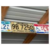 Row of Assorted Vintage License Plates