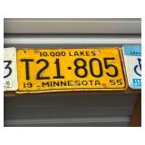 Row of Assorted Vintage License Plates