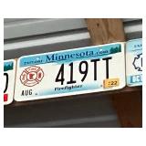Row of Assorted Vintage License Plates