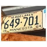 Row of Assorted Vintage License Plates