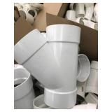 ASSORTED WHITE PVC PLUMBING PARTS