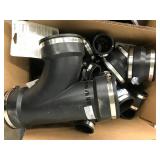 ASSORTED BLACK RUBBER PLUMBING PARTS