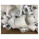BOX OF ASSORTED WHITE PVC PLUMBING ITEMS