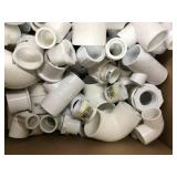 BOX OF ASSORTED WHITE PVC PLUMBING ITEMS