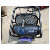 Dual tank air compessor on wheels. Tested & works. As shown.