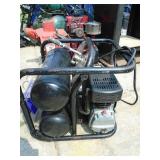 Dual tank air compessor on wheels. Tested & works. As shown.