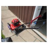 Troy Bilt push mower. Looks nearly new. Tested & works. As shown.