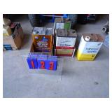 Cans of mineral spirits & leather oil. As shown.