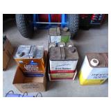 Cans of mineral spirits & leather oil. As shown.