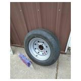 New ST145r12 trailer on 5 hole rim. As shown.