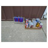 Flat of vintage oil products. One can opened. Others sealed. As shown.