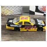 1999 Nascar Action Ward Burton Pontiac #22 / Caterpillar 1:24 scale die cast stock car