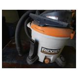 Rigid shop vacuum and 3 Little Debbie display tables