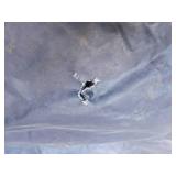 Portable fish house with wood stove