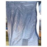 Portable fish house with wood stove