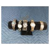 4 Bracelet style watches and 1 bracelet