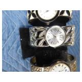 4 Bracelet style watches and 1 bracelet