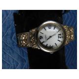 4 Bracelet style watches and 1 bracelet