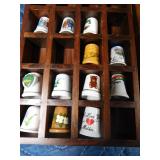 2 small shadow boxes with ceramic and wood Thimbles