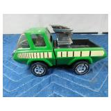 Tonka truck with engine in bed