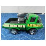 Tonka truck with engine in bed