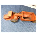 vintage metal tractor with grain hauler and old metal semi