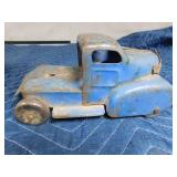 vintage metal tractor with grain hauler and old metal semi