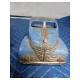 vintage metal tractor with grain hauler and old metal semi