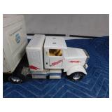 Metal True value pick-up truck, Napa Auto parts semi trailer and a Milwaukee semi