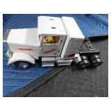 Metal True value pick-up truck, Napa Auto parts semi trailer and a Milwaukee semi