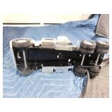 Metal True value pick-up truck, Napa Auto parts semi trailer and a Milwaukee semi