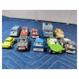 Box of die cast cars and trucks