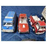 Box of die cast cars and trucks
