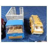 Box of die cast cars and trucks