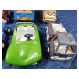 Box of die cast cars and trucks