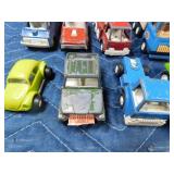 Box of die cast cars and trucks