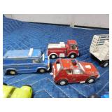 Box of die cast cars and trucks