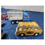 Box of die cast cars and trucks