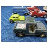 Box of die cast cars and trucks