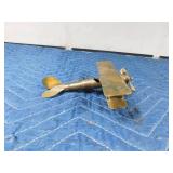 Brass airplane made out of a bullet