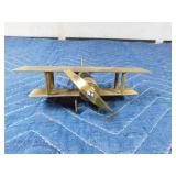 Brass airplane made out of a bullet