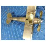 Brass airplane made out of a bullet