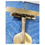 Brass airplane made out of a bullet