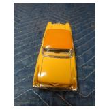 2 die cast cars and 1 tin car